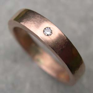 9ct Red Gold band set with a single Diamond