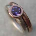 Amethyst and red gold ring