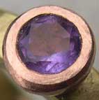 close up of an Amethyst engagement ring