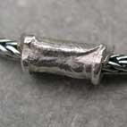 textured silver bead