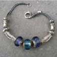silver and blue beaded bracelet
