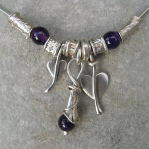 amethyst necklace with heart charms