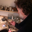 Michael Jefferies designer making earrings in the workshop