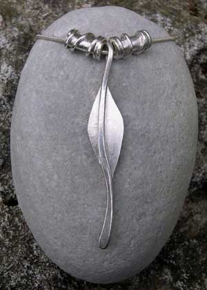 Silver Jasmin leaf pendant with twist beads