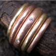 Red gold eternity with  wedding rings
