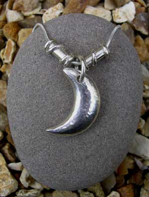 Silver moon pendant with 2 twist beads