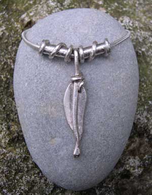 Feather pendant with 2 twist beads