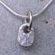Silver pebble on a chain