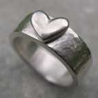 Wide silver band with a silver heart