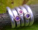 designer engagement ring stack with amethyst and ruby
