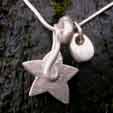 star necklace with pebble charm