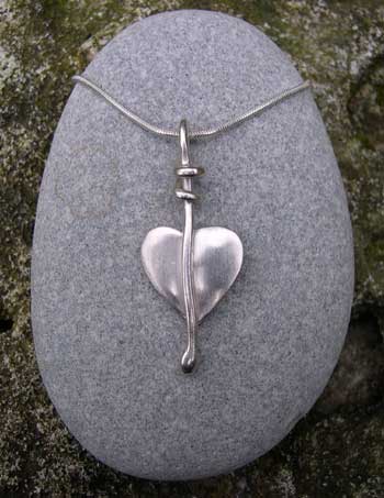 Silver heart pendant on a silver snake chain