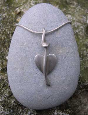 silver leaf pendant on a chain