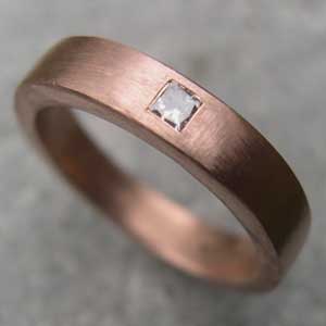 Square diamond engagement ring in red gold