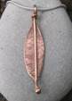 red gold  leaf design pendant