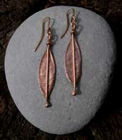 red gold leaf design earrings