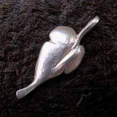 a chunky silver leaf pendant, the left hand leaf of the pair