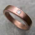 square diamond set in red gold band