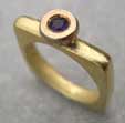 Amethyst set in 18ct gold square ring