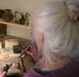 Sue Yeoman  designer making earrings in the workshop